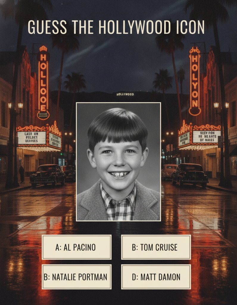 A black and white archival photo of a young Mickey Rooney smiling as a child similar to a classic Hollywood studio portr