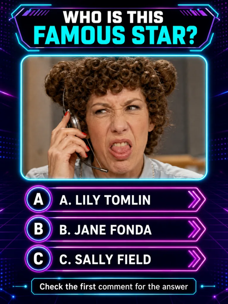 A portrait of Lily Tomlin smiling showing her characteristic short hairstyle