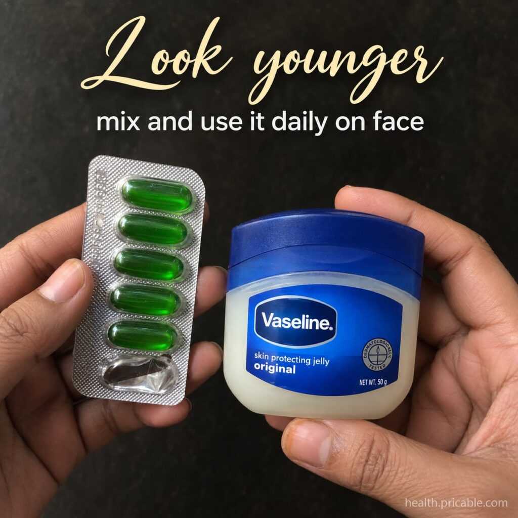 A small glass jar with a mixture of Vaseline and the contents of a green gel capsule ready for application on the skin