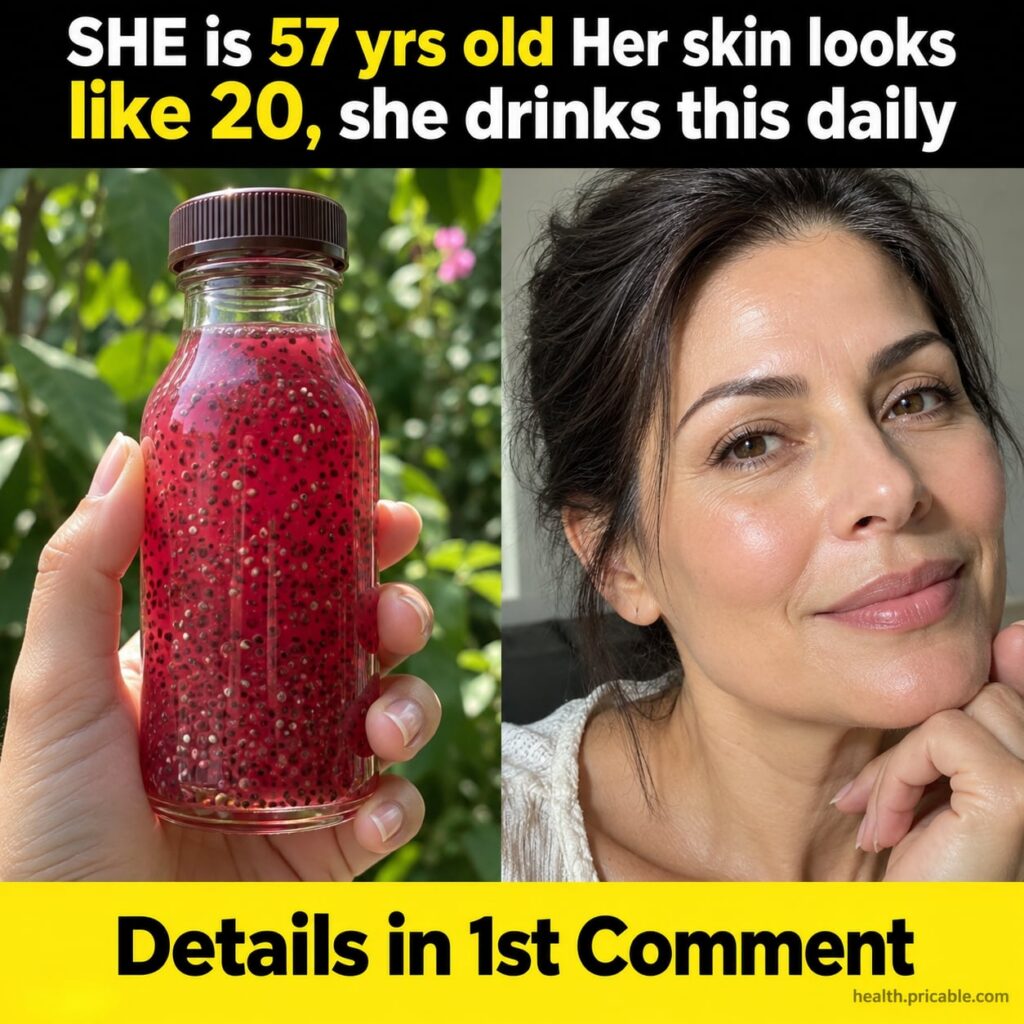 A vibrant colorful smoothie in a glass next to fresh berries ginger and chia seeds on a light wooden surface suggesting 