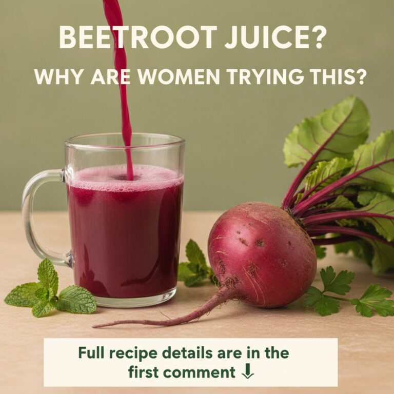 A close-up of a vibrant glass of beetroot juice with fresh beetroots and leaves in the background suggesting natural hea
