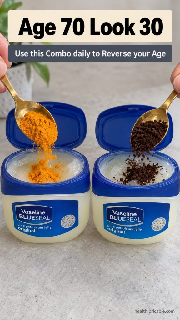 A small bowl containing a creamy yellow paste made from Vaseline turmeric and coffee grounds with a mixing spoon beside 