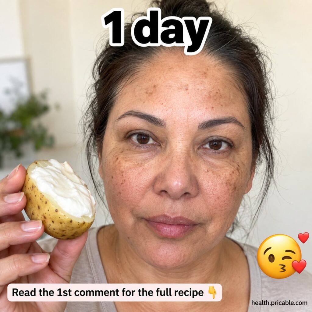 A bowl of freshly grated potato pulp and juice ready to be mixed into a face mask Some raw potato slices are beside it