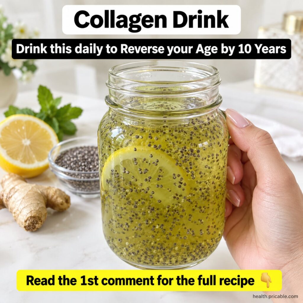 A clear glass with a refreshing light yellow beauty drink garnished with lemon slices ginger and cucumber set on a brigh