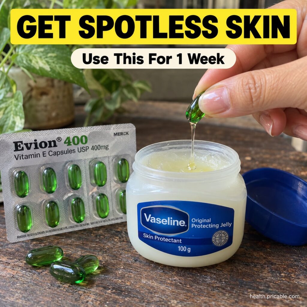 A small glass jar with a homemade balm of Vaseline and Vitamin E with a couple of Vitamin E capsules next to it