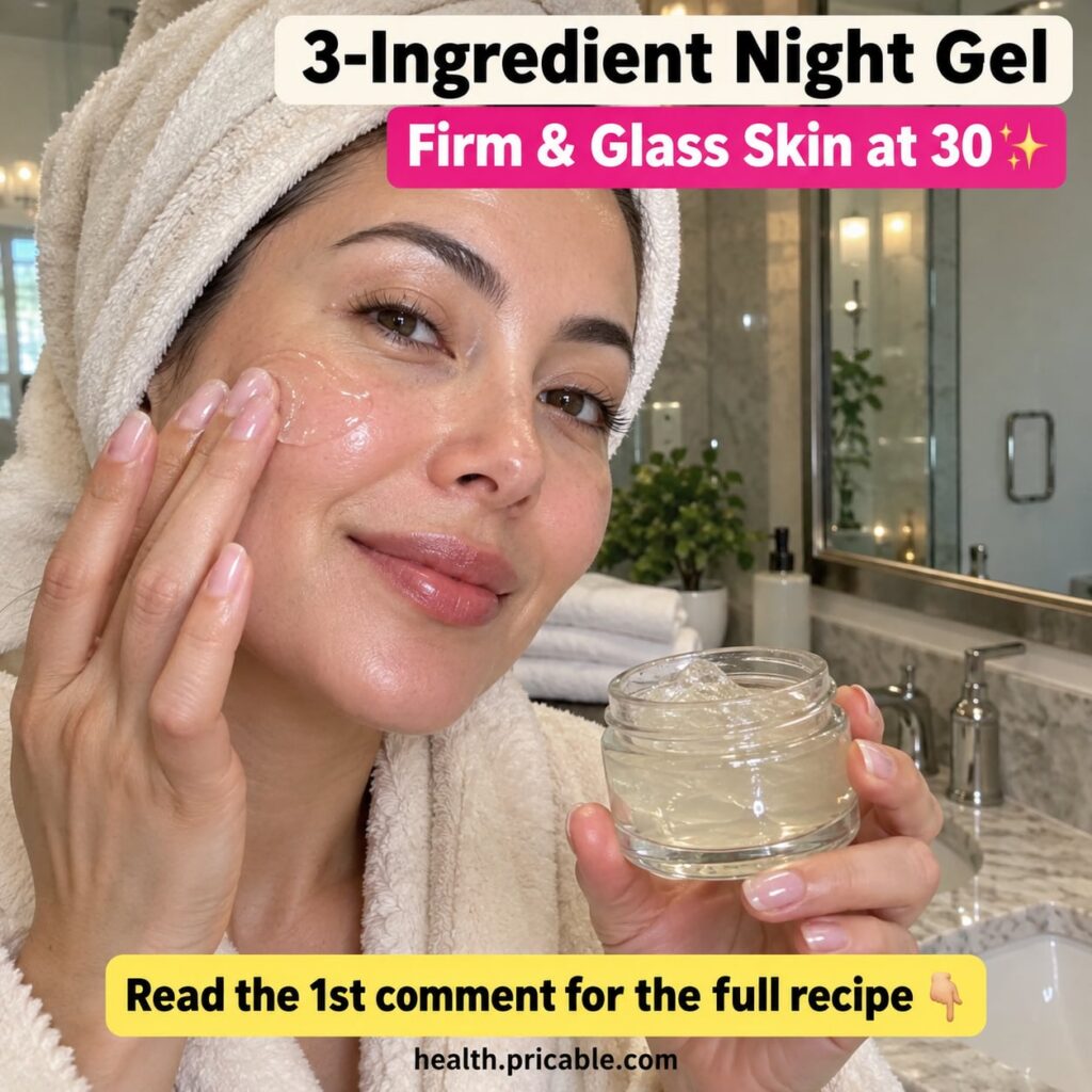 A small clear glass jar of homemade night gel on a wooden surface with fresh aloe vera leaves and rose petals subtly in