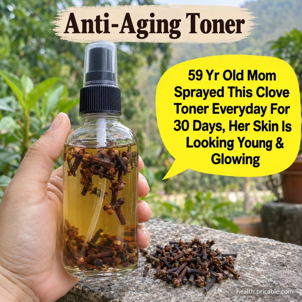 A radiant woman in her late 50s with smooth glowing skin holding a small bottle of homemade clove toner in a beautifully