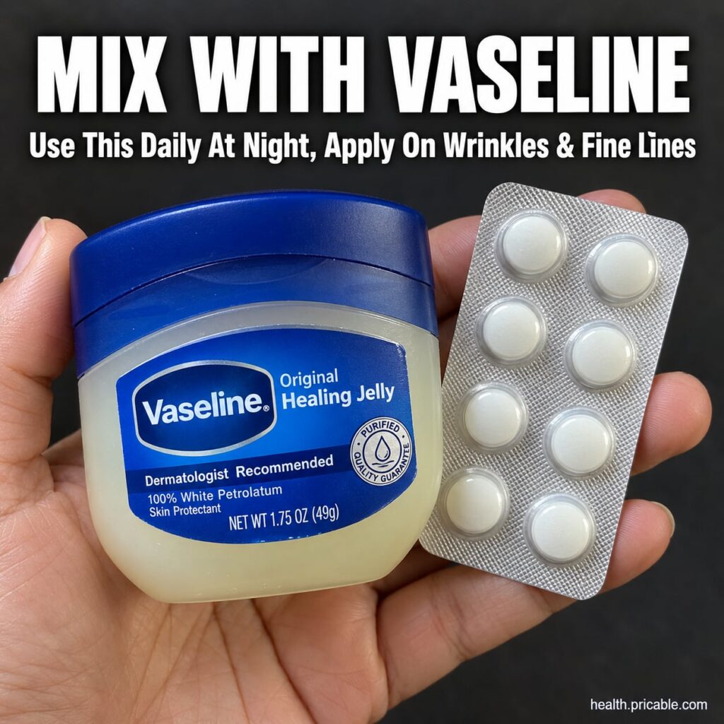 A small tub of Vaseline next to a bottle of Vitamin E oil on a clean soft surface implying a simple beauty routine