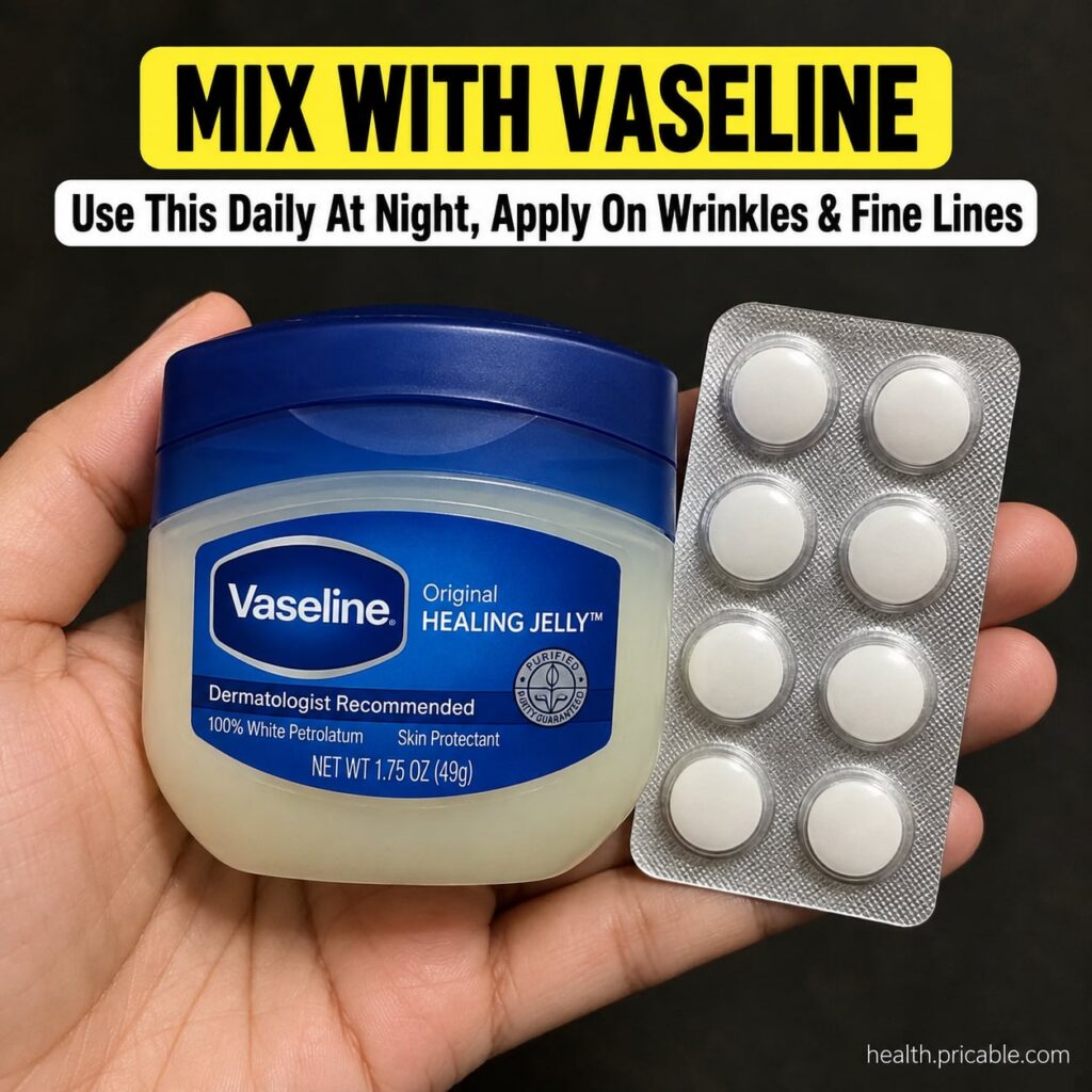 A jar of Vaseline next to a small bowl containing a mixture of Vaseline and olive oil with a small spoon The setting is 