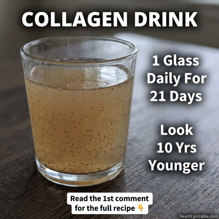 A beautiful glass with a mixed collagen drink and a few whole cloves next to it set on a natural wooden surface The drin