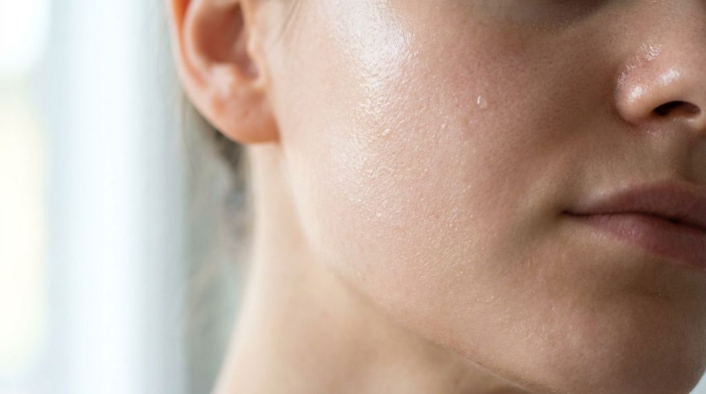 A close-up of healthy glowing skin that looks well-hydrated and smooth demonstrating the desired results of consistent o