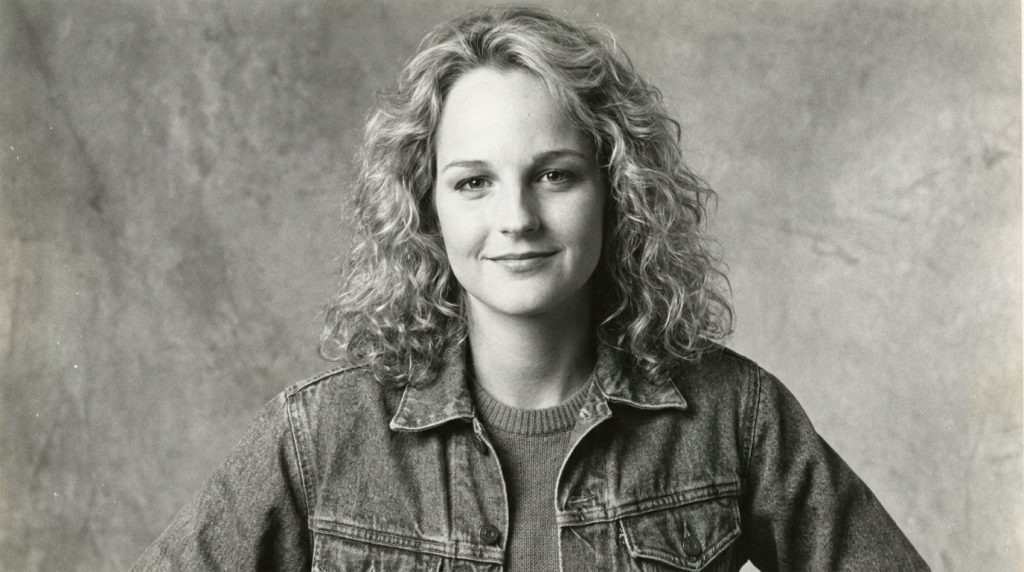 A real archival photo of a young Helen Hunt from her early career possibly a publicity shot showcasing her youthful appe