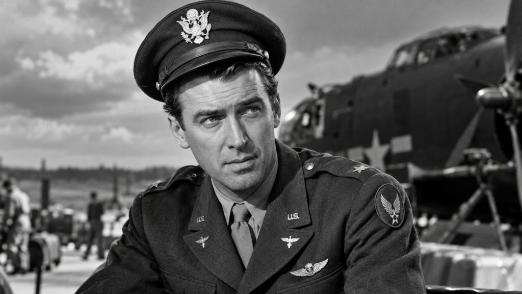 A black and white photo of James Stewart in his U S Army Air Corps uniform during World War II looking serious and disti
