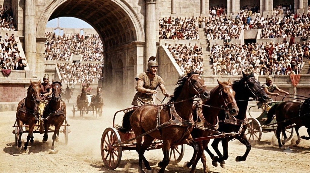 Charlton Heston as Ben-Hur in the famous chariot race scene
