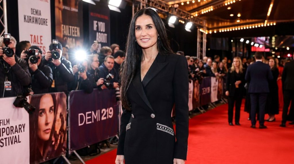 Demi Moore looking elegant and confident at a recent film festival symbolizing her career comeback