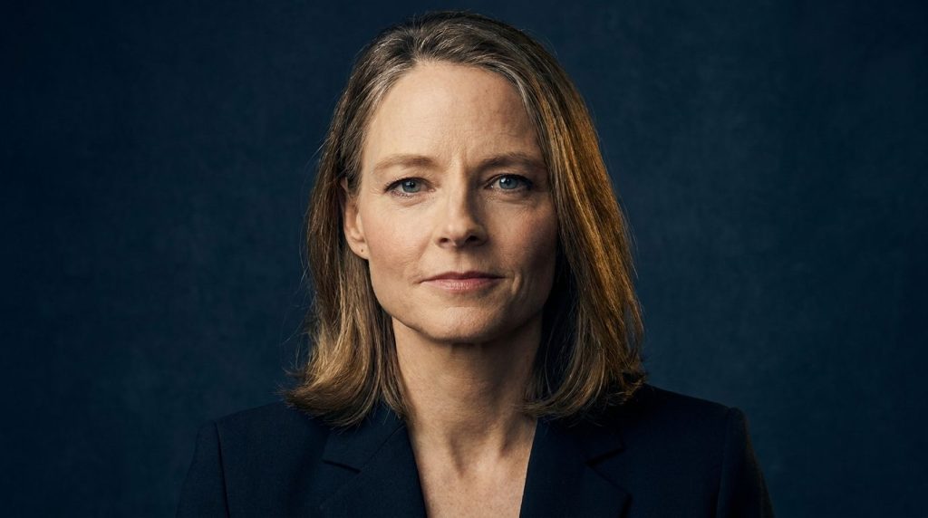 Jodie Foster as a mature acclaimed actress looking elegant and powerful against a deep navy cinematic background with su