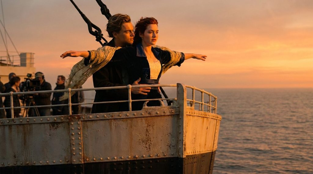 Kate Winslet and Leonardo DiCaprio on the bow of the Titanic arms outstretched during the iconic I m flying scene from t