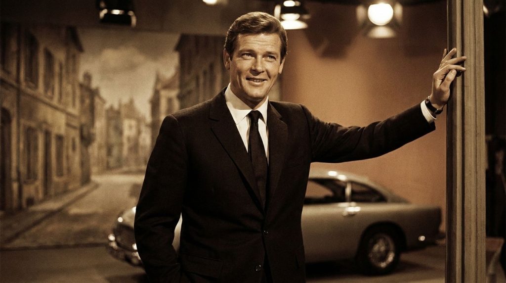 Roger Moore as Simon Templar in The Saint looking debonair with a confident smile