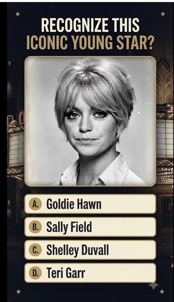 A black and white portrait of a young Goldie Hawn with her signature short layered hairstyle set against a vintage movie