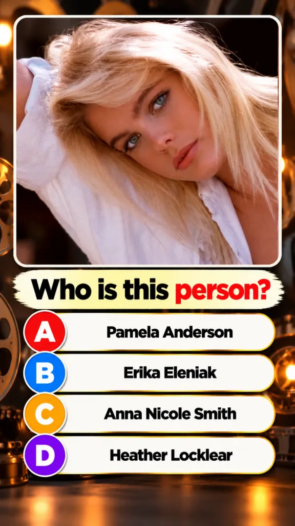 A young Erika Eleniak with blonde hair and blue eyes smiling slightly wearing a white top This is the quiz image