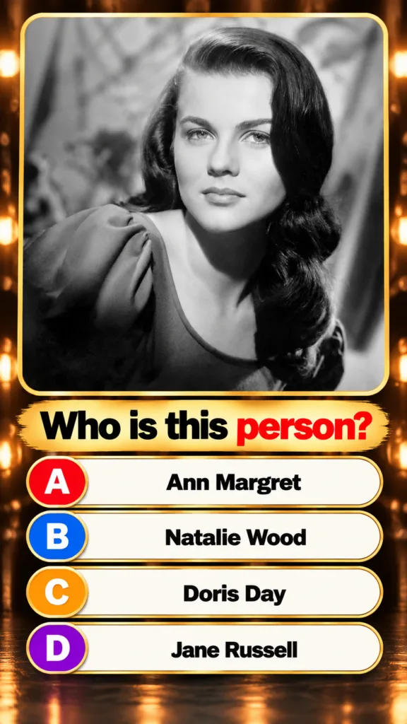 Black and white portrait of a young Ann-Margret with soft wavy hair wearing a simple dress similar to the quiz image but