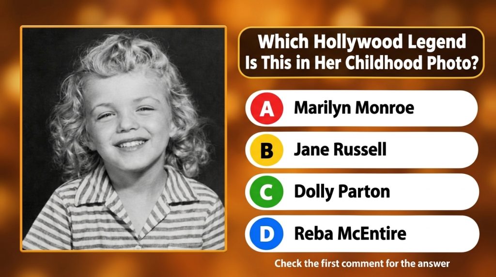 A black and white childhood photo of Marilyn Monroe a young girl with light curly hair smiling subtly The image has a cl