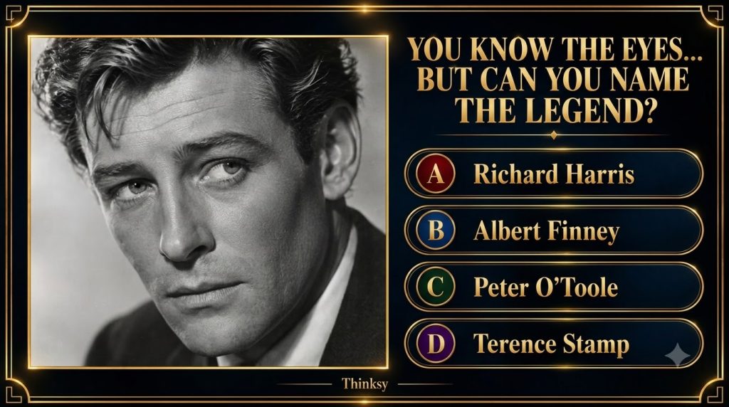 A black and white close-up of Peter O Toole s intense eyes and upper face framed by golden decorative borders as part of