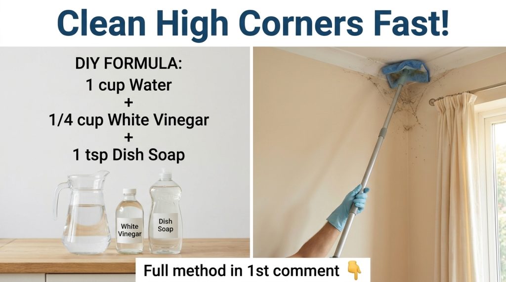 A person using an extendable duster to clean a high corner where a wall meets the ceiling and a curtain rod The room is 
