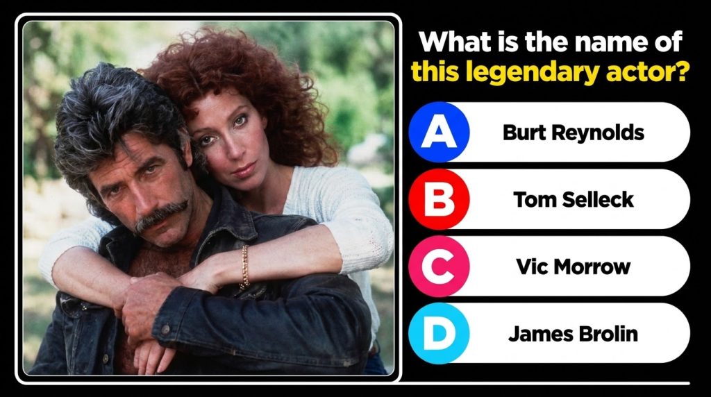 A still from the movie Mask showing Cher with voluminous red curly hair and Sam Elliott with his distinctive mustache in