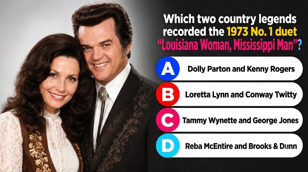 A studio portrait of a smiling man and woman a country music duo The woman has dark voluminous hair and wears a lace blo
