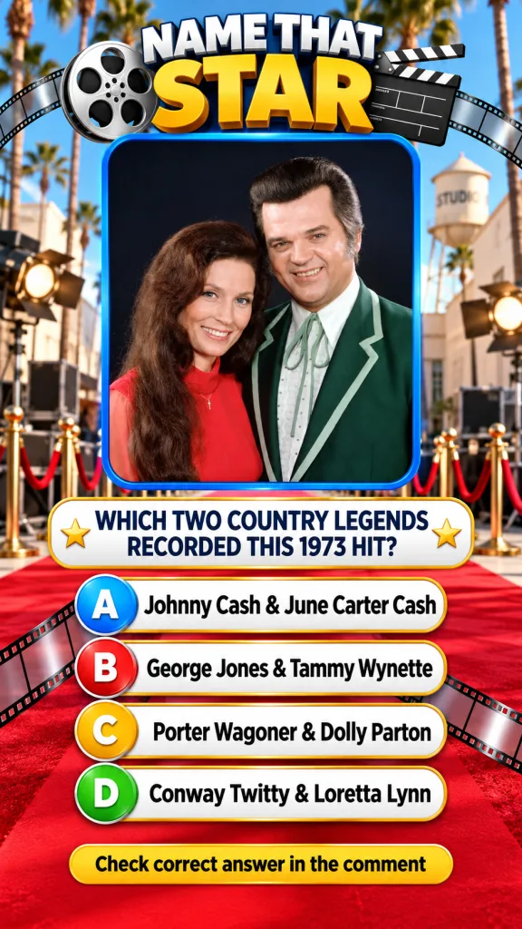 A framed photo of Loretta Lynn and Conway Twitty smiling in their iconic 1970s Western stage attire with a vibrant red c