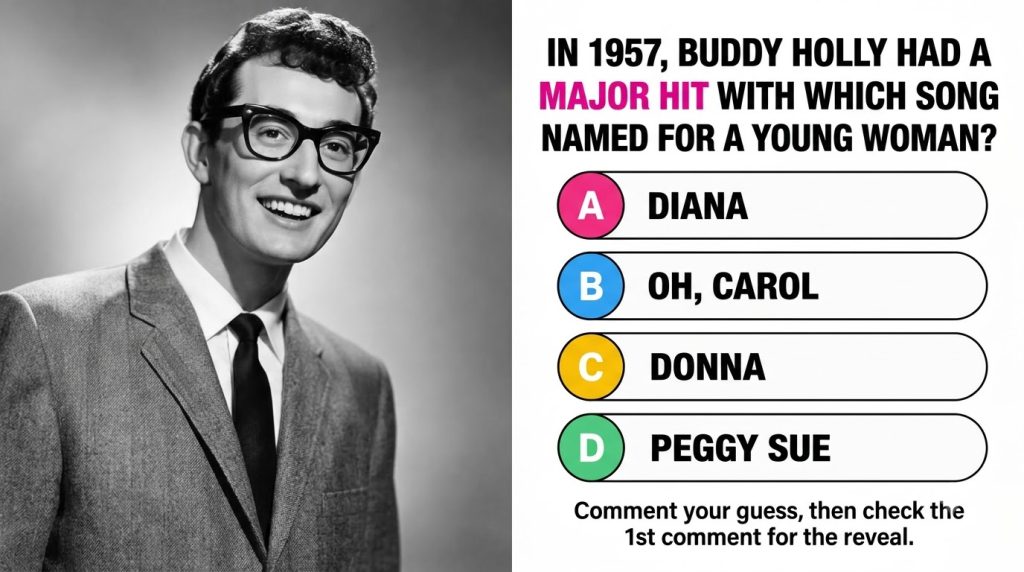 Black and white portrait of a young Buddy Holly wearing glasses and a suit smiling