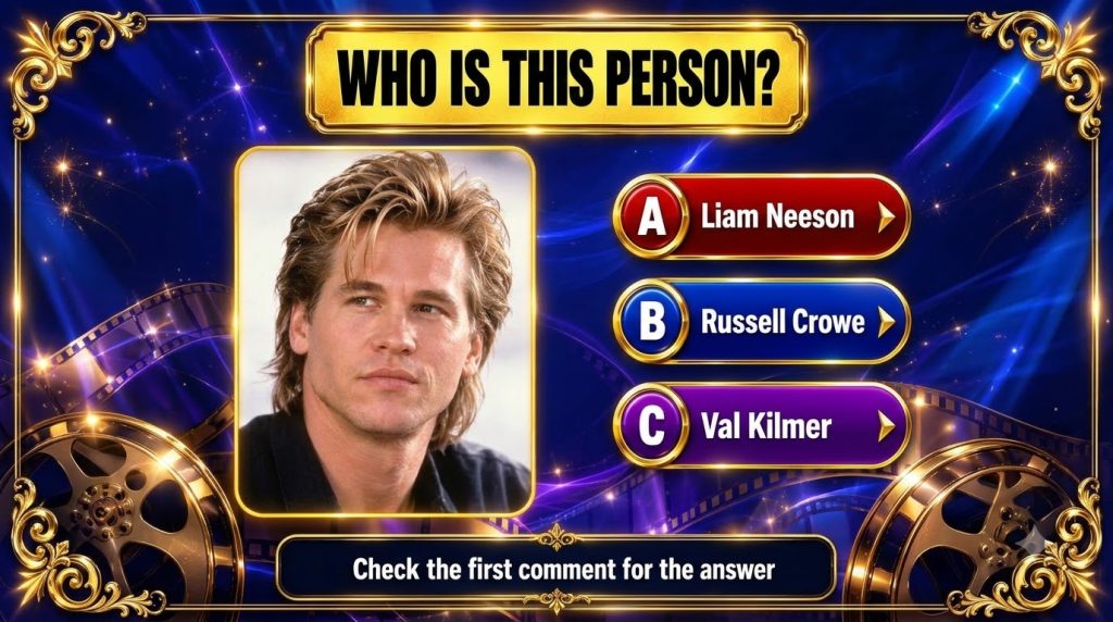 A vertical mobile-format quiz card showing a headshot of actor Val Kilmer with the question WHO IS THIS PERSON and answe