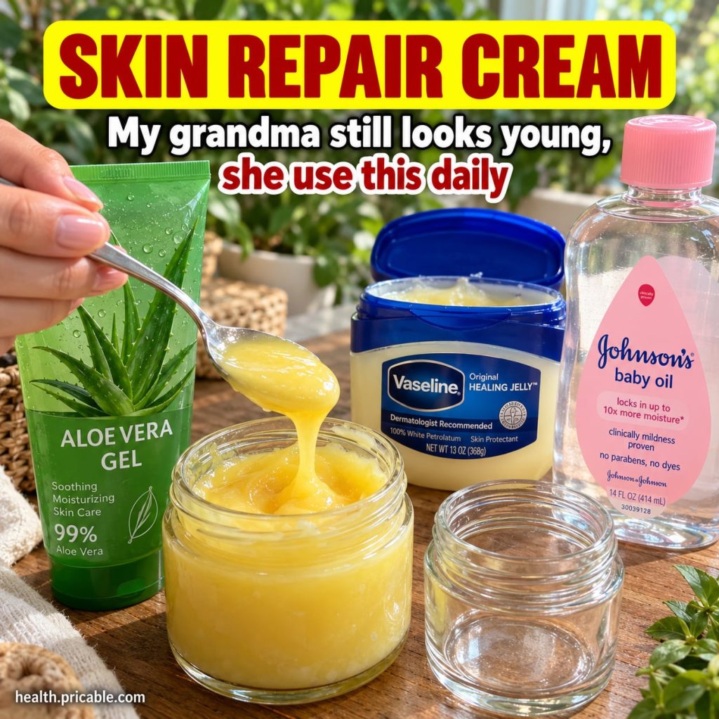 A vintage-style jar of homemade cream on a rustic wooden surface with a fresh aloe vera leaf and a bottle of almond oil