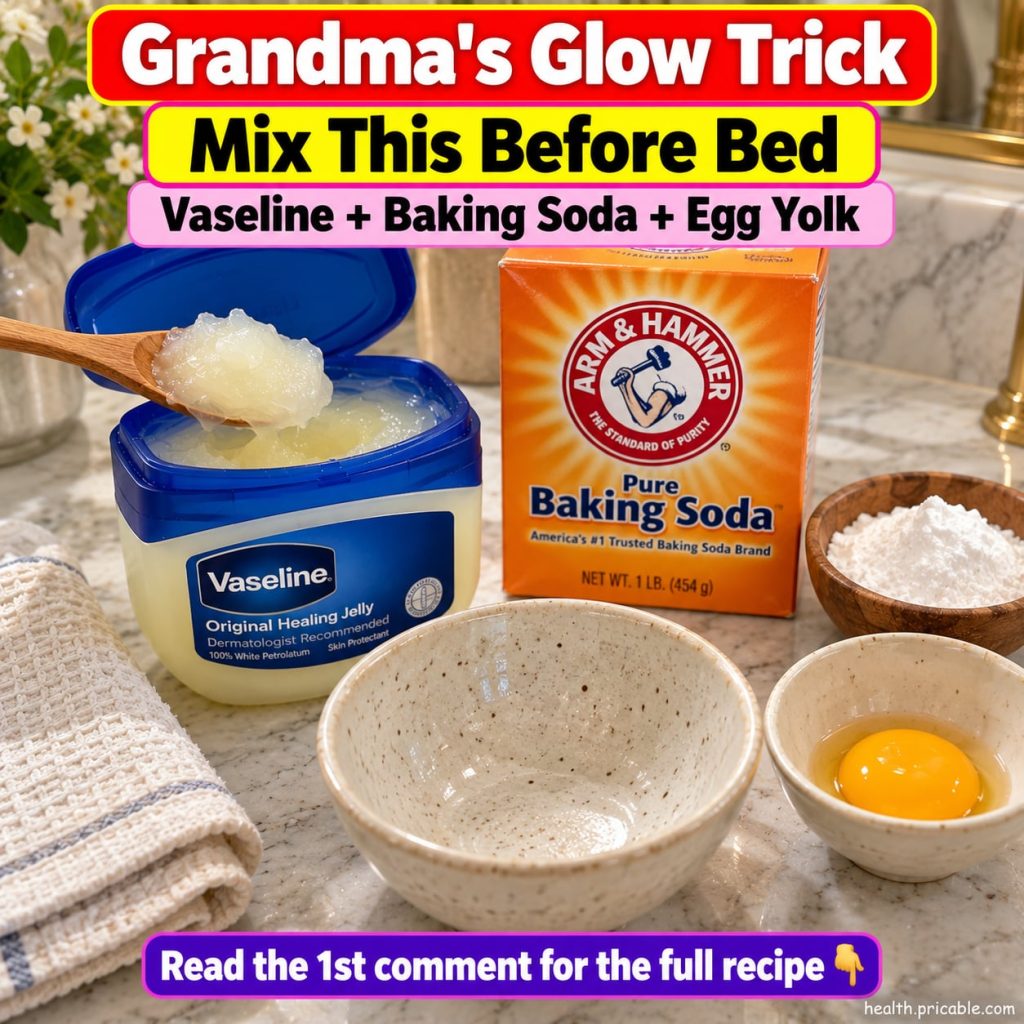 A close-up of a small bowl containing Vaseline a separate small bowl with baking soda and an egg yolk in a third small b