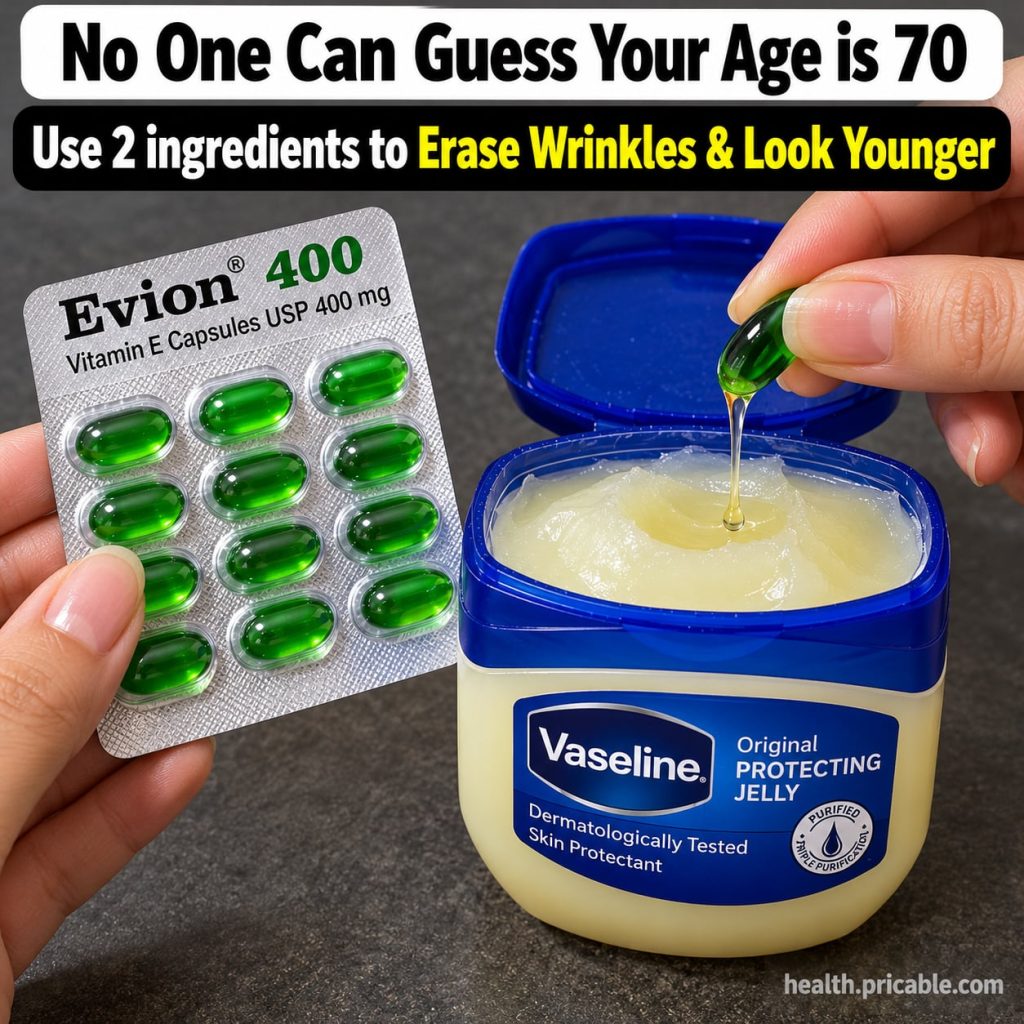 A small glass jar filled with petroleum jelly with a few Vitamin E capsules placed next to it on a clean surface