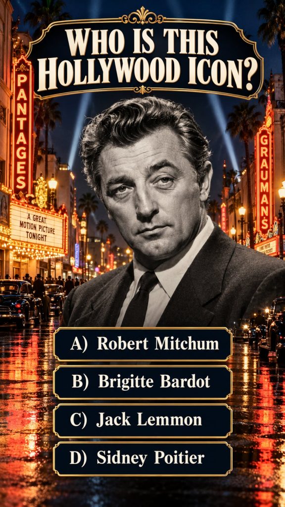 A black and white close-up photo of a young Robert Mitchum typical of 1940s Hollywood publicity shots