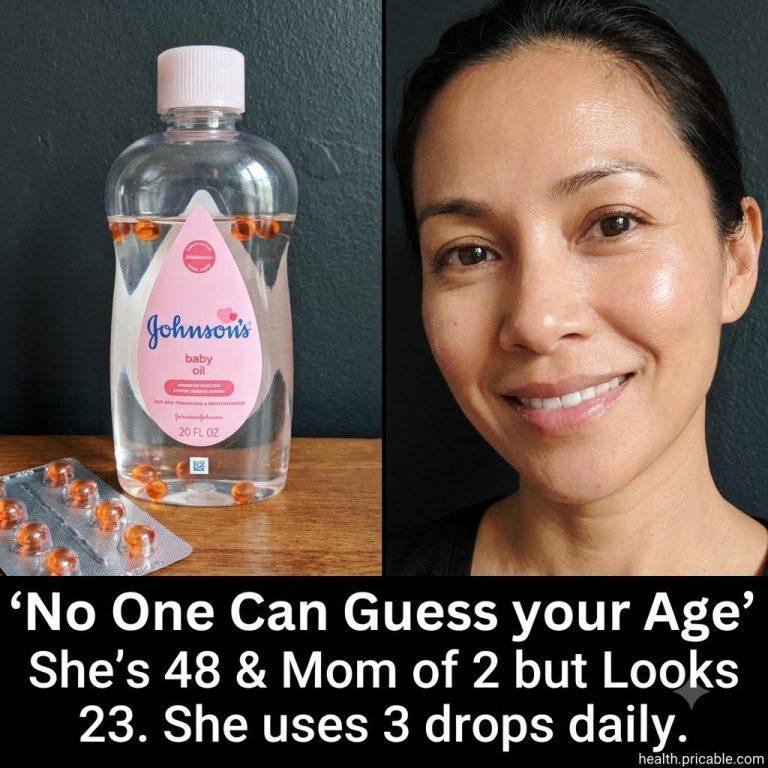 A bottle of baby oil on a clean light surface with a soft focus on the oil itself conveying a sense of gentleness and sk